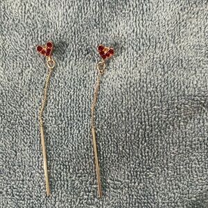 Heart dangling earrings, pink stones